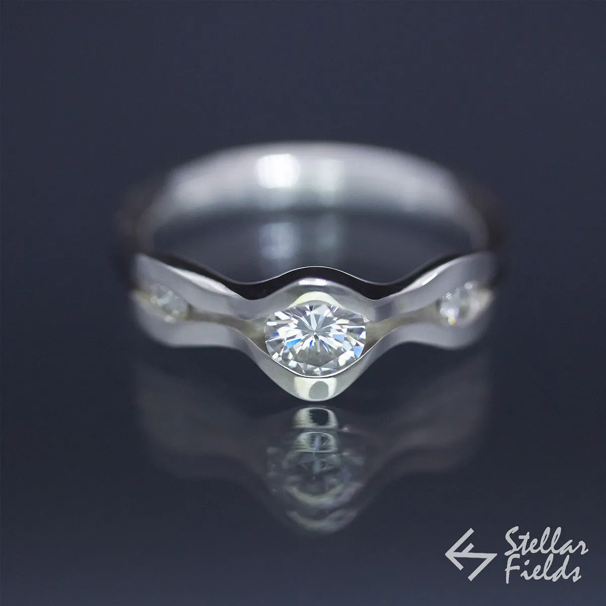 Forever Brilliant Moissanite Three Stone Channel Set Wave Engagement Ring