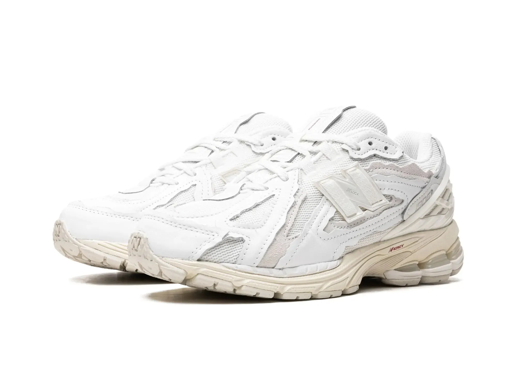 Sure! The optimized title for this e-commerce product would be: White New Balance 1906D Protection Pack for Enhanced Performance.